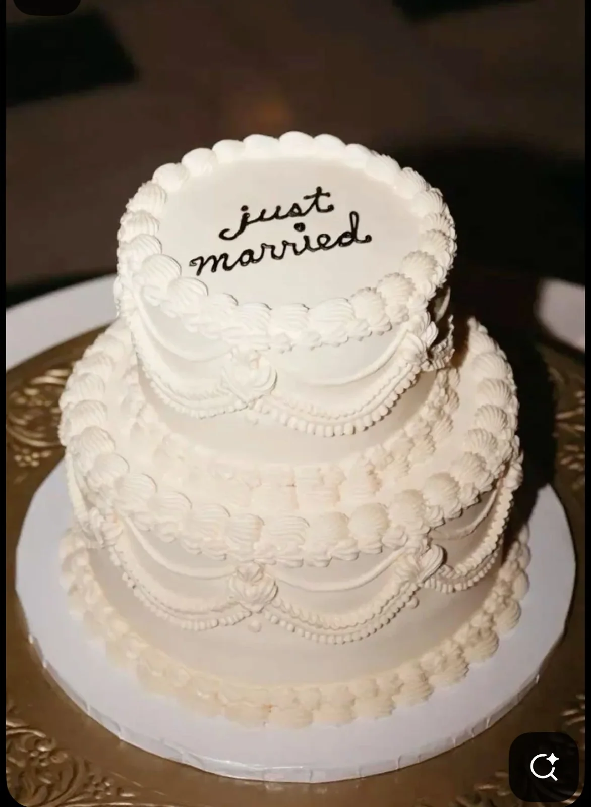 Two-tier piped Just Married wedding cake